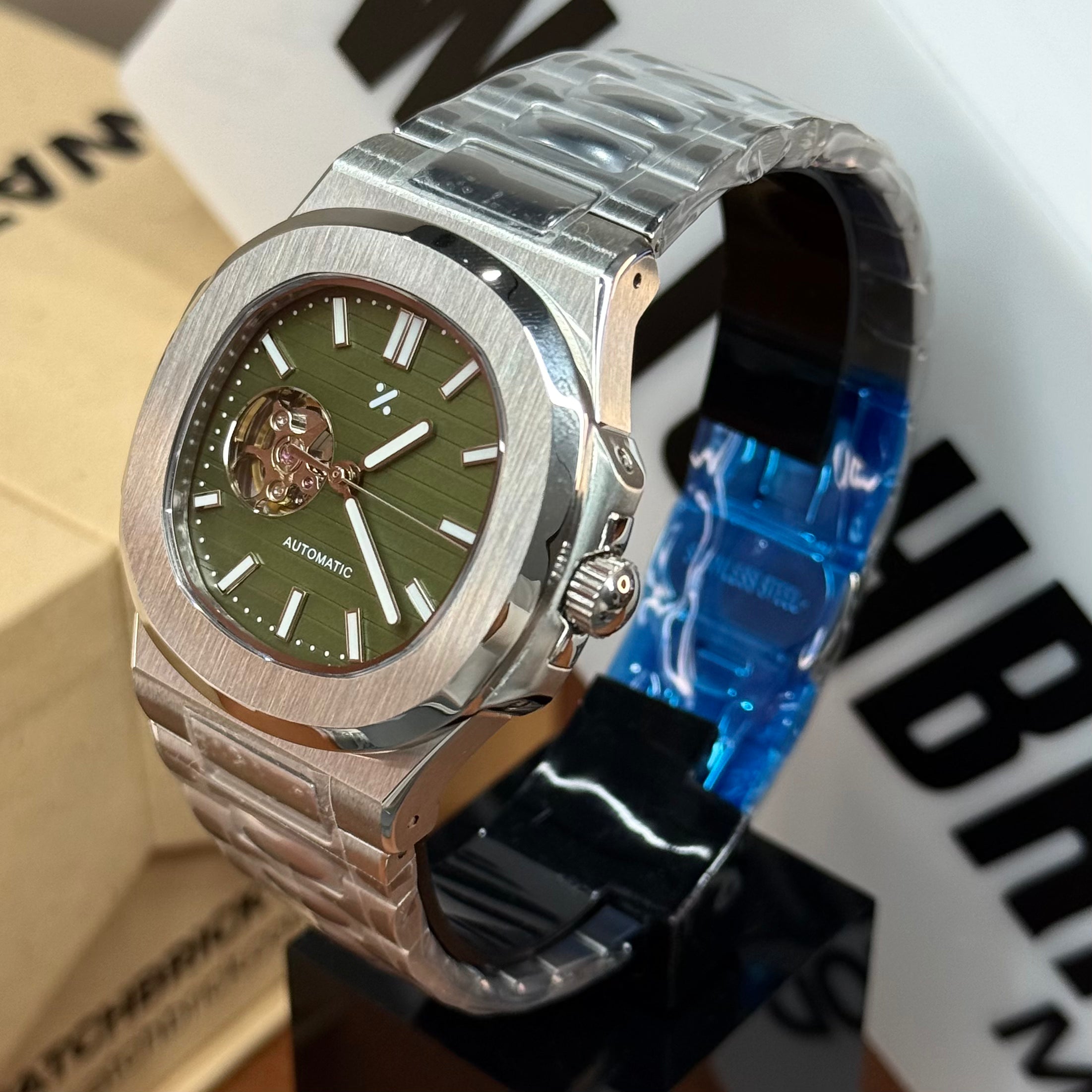 NAUTIKO | Emerald Open-Heart NH38